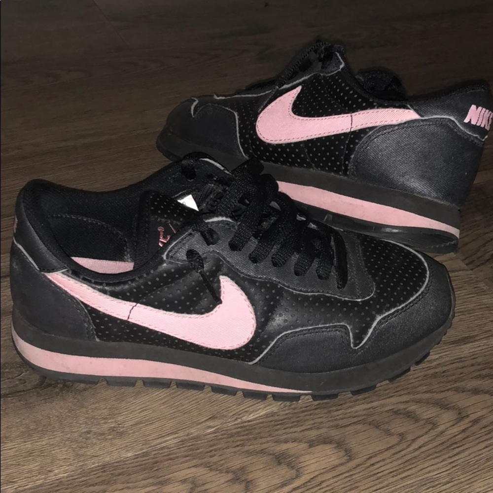 Black, dark grey, and light pink Nike’s